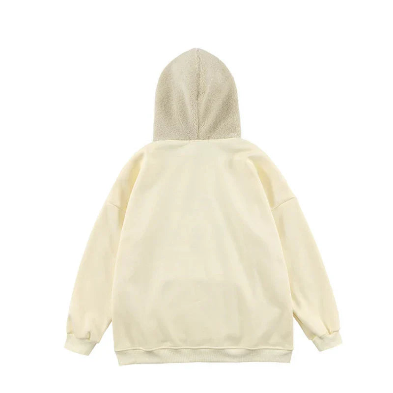 Kalpli ve Bitkisel Motiflerle Süslenmiş Rahat Kesim Sweatshirt
